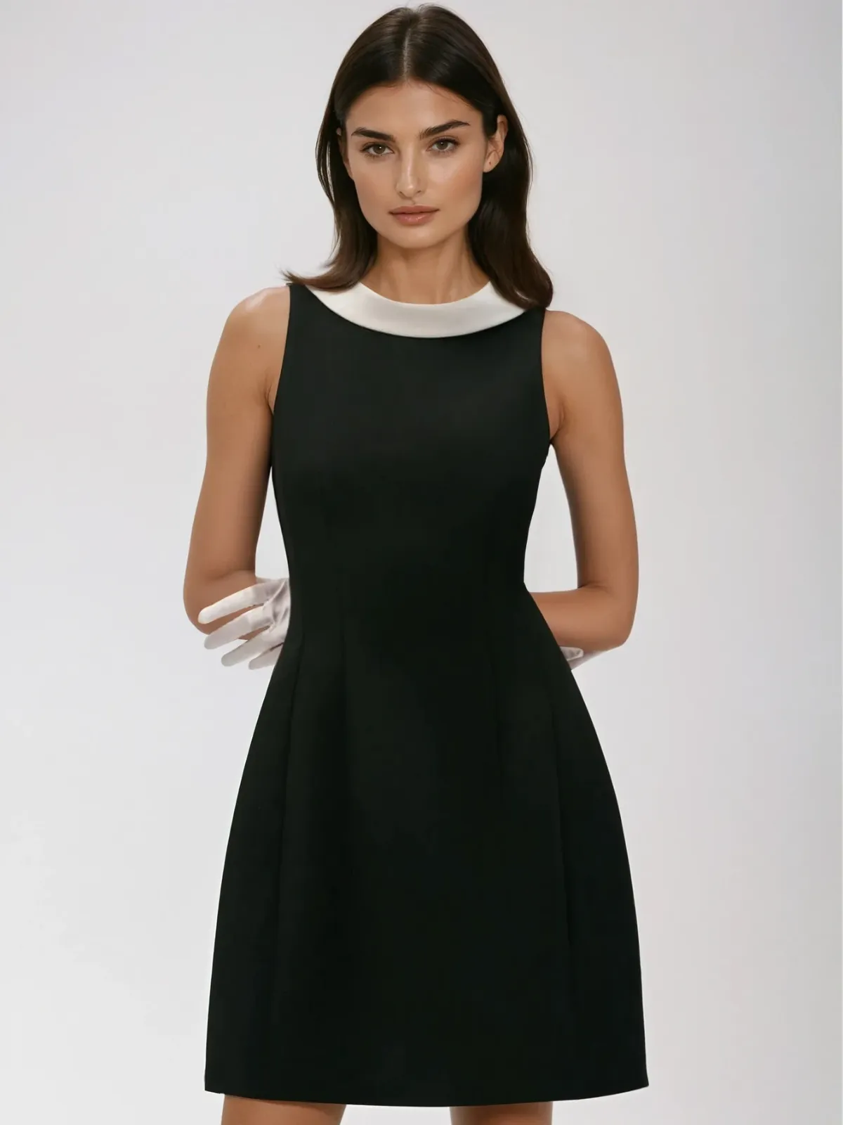 Kaitlin Sleeveless Bow Mini Dress sold by Mew Mews