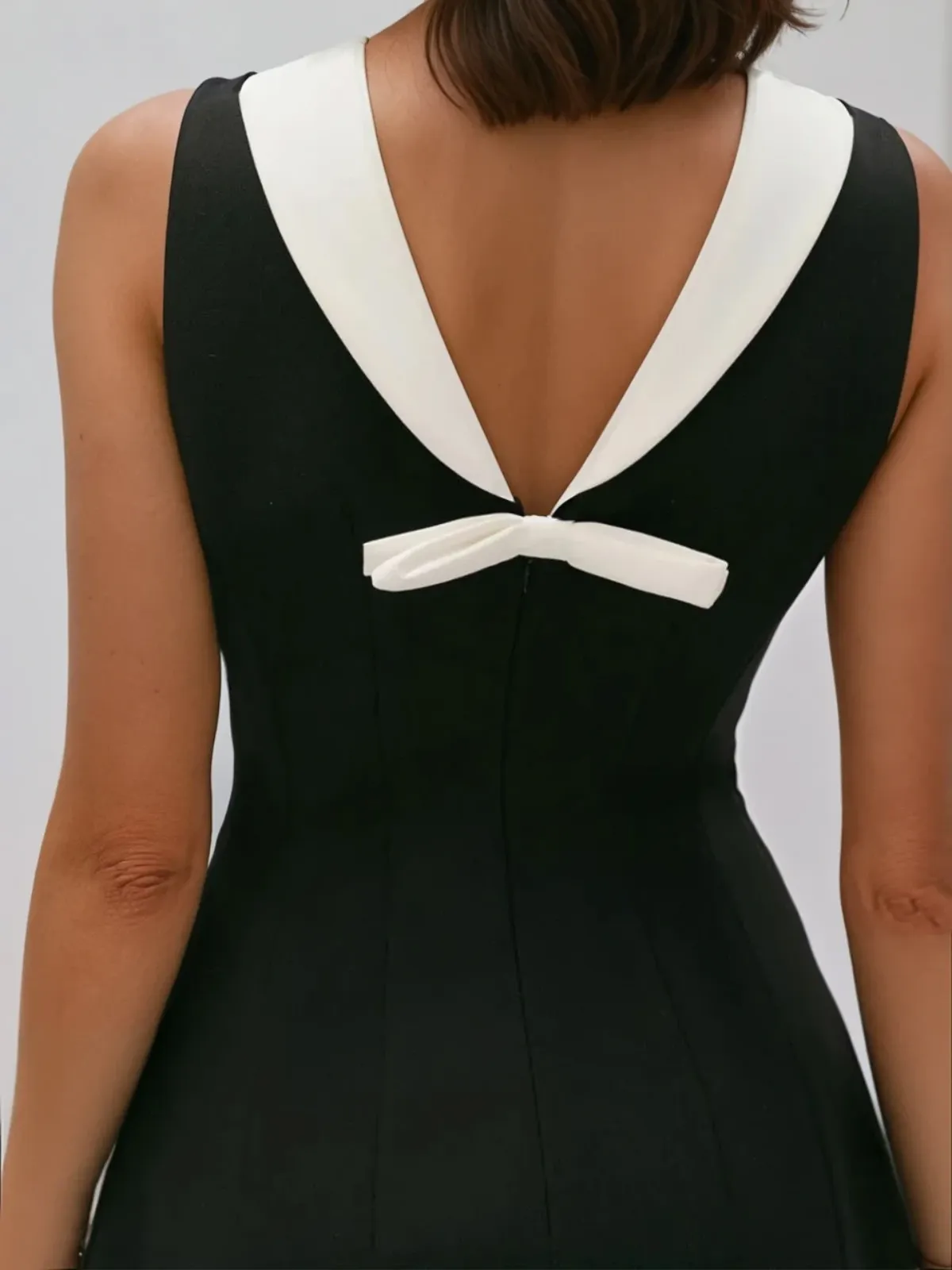 Kaitlin Sleeveless Bow Mini Dress sold by Mew Mews product image thumbnail 4