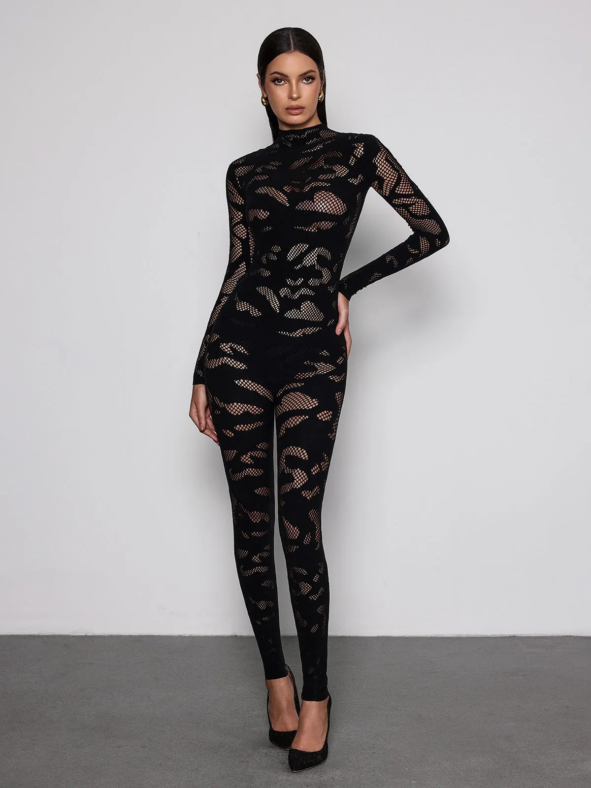 Quasarion High Neck Cutout Jumpsuit sold by Mew Mews
