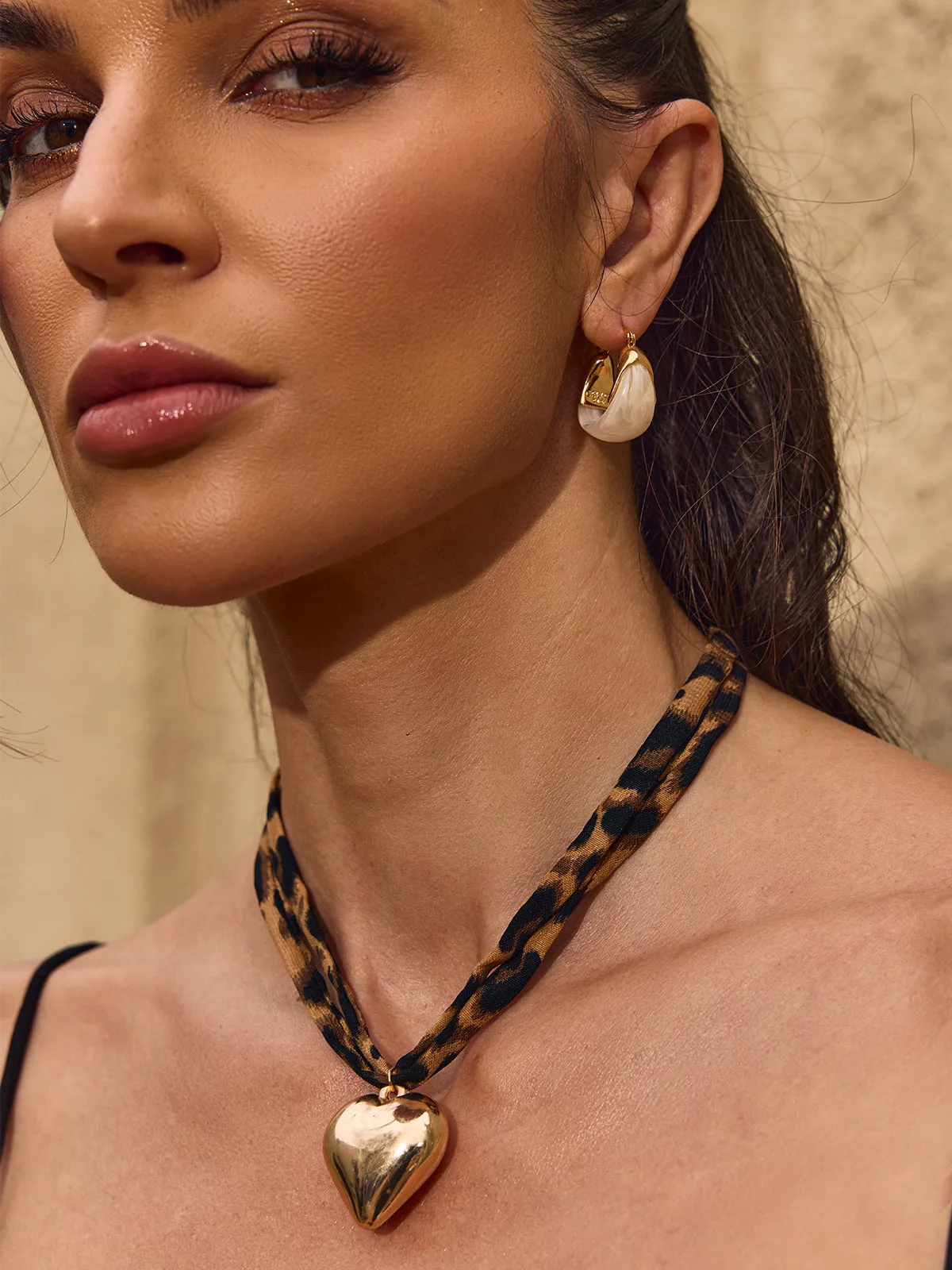 Chelsia U Shaped Resin Earrings sold by Mew Mews product image thumbnail 3