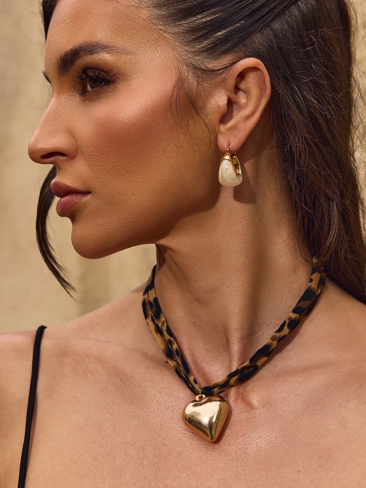 Chelsia U Shaped Resin Earrings sold by Mew Mews