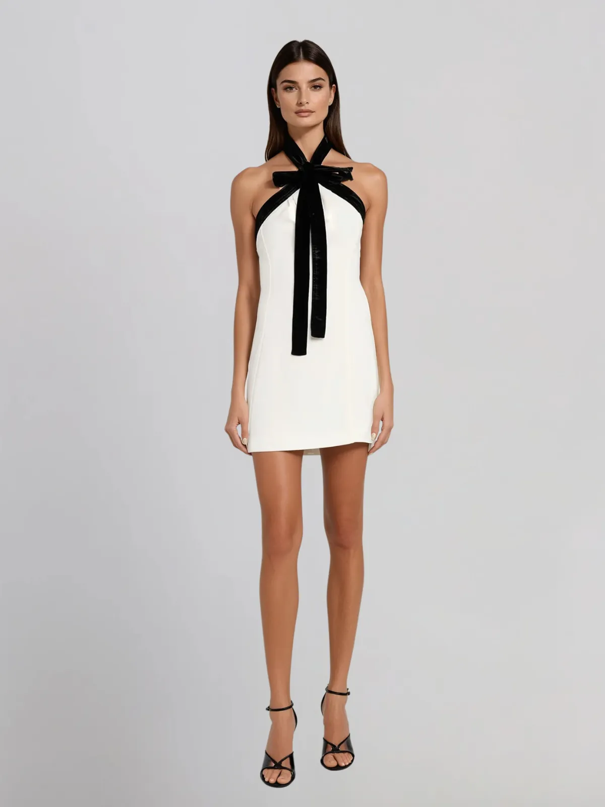 Ostrel Halterneck Bow Mini Dress sold by Mew Mews