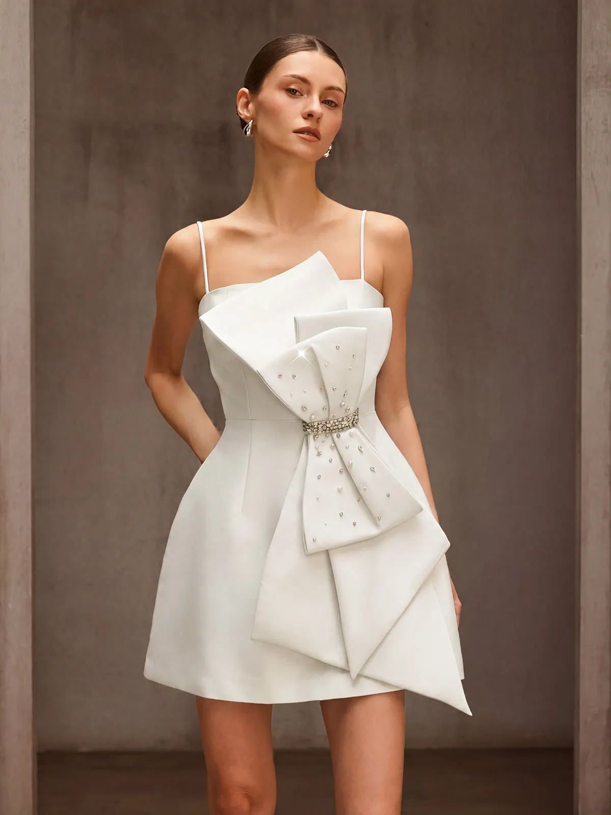 Dracen Spaghetti Bow Rhinestone Mini Dress In White sold by Mew Mews