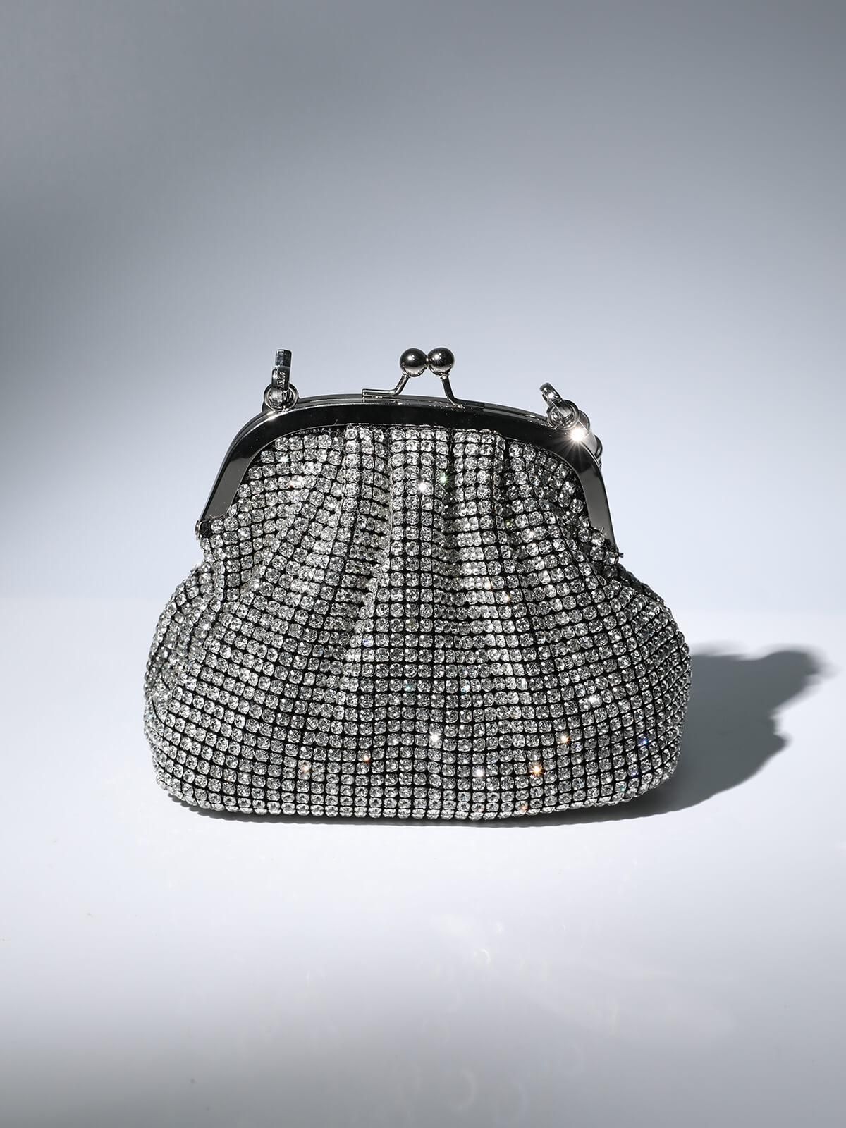 Mairead Shell Clutch In Silver sold by Mew Mews