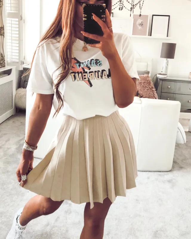 Cancelled Plans Pleated Skirt in Nude sold by Fearless
