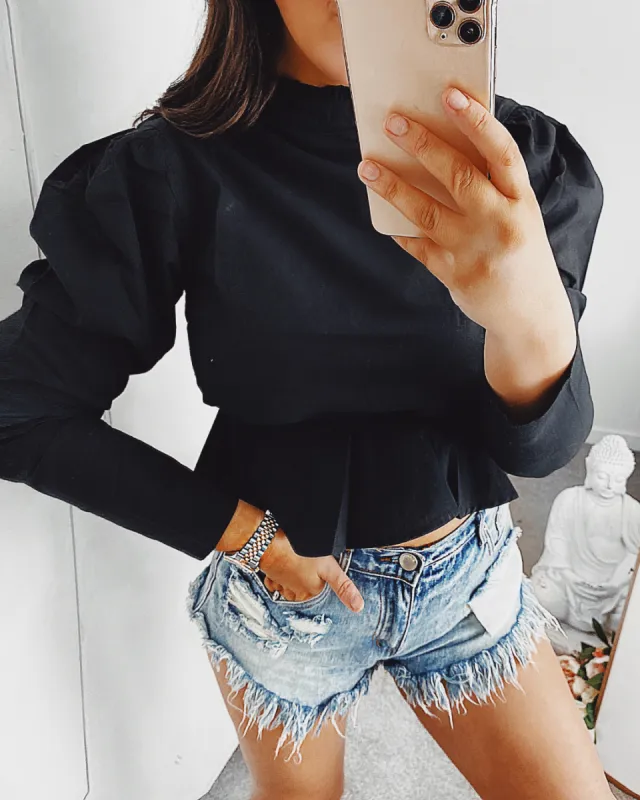 Harmony Peplum Top Black sold by Fearless