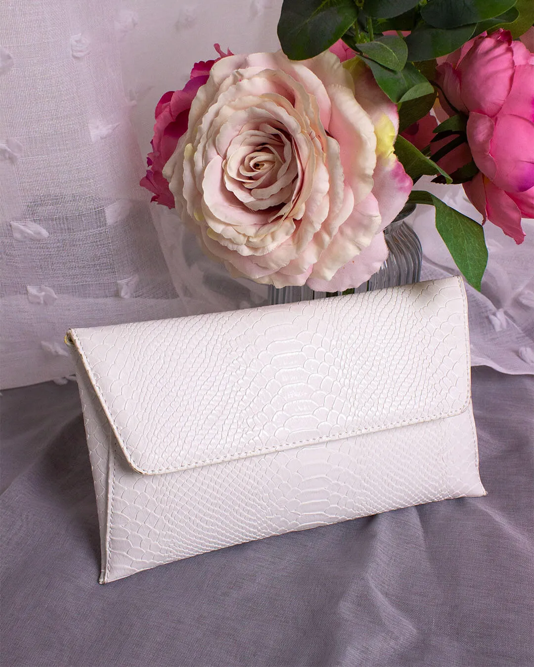 MEDUSA Snake Clutch Bag in White sold by Fearless