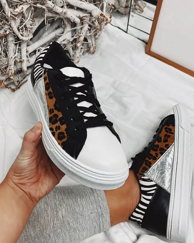 Tracey Trainer White sold by Fearless