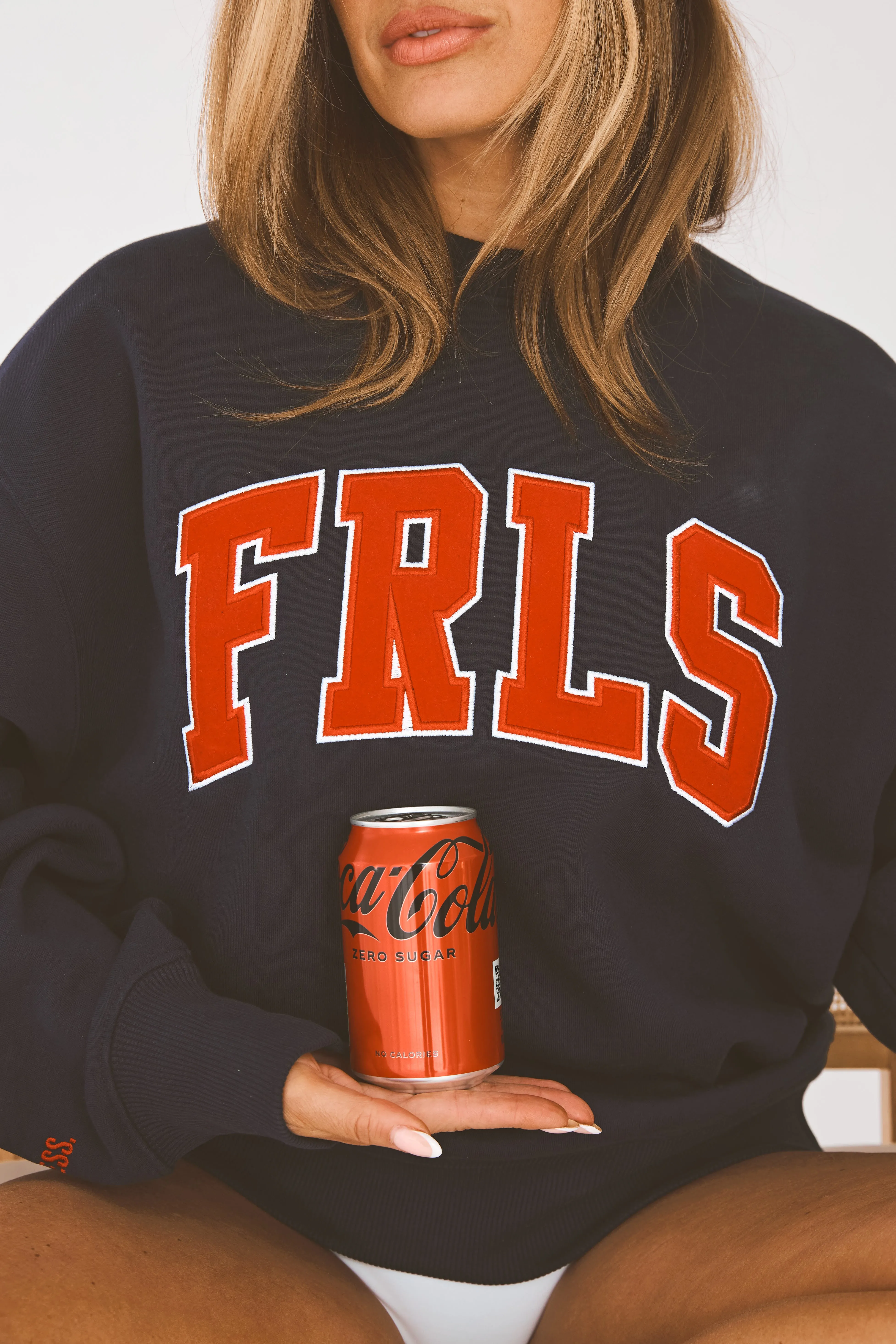 The Collegiate Sweatshirt in Team Spirit sold by Fearless