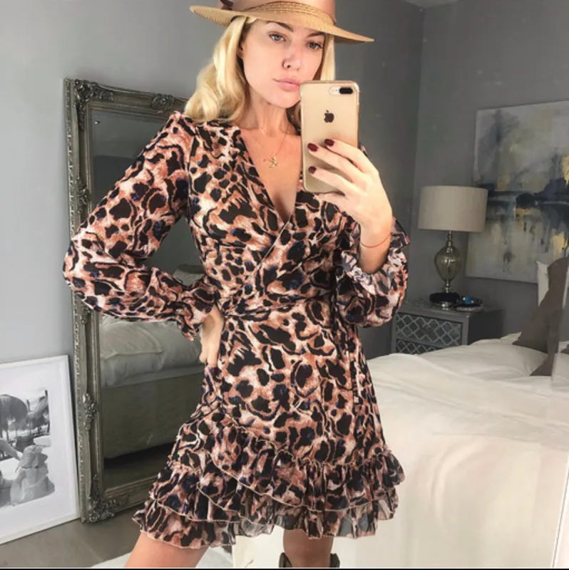 Nala Leopard Print Wrap Dress sold by Fearless