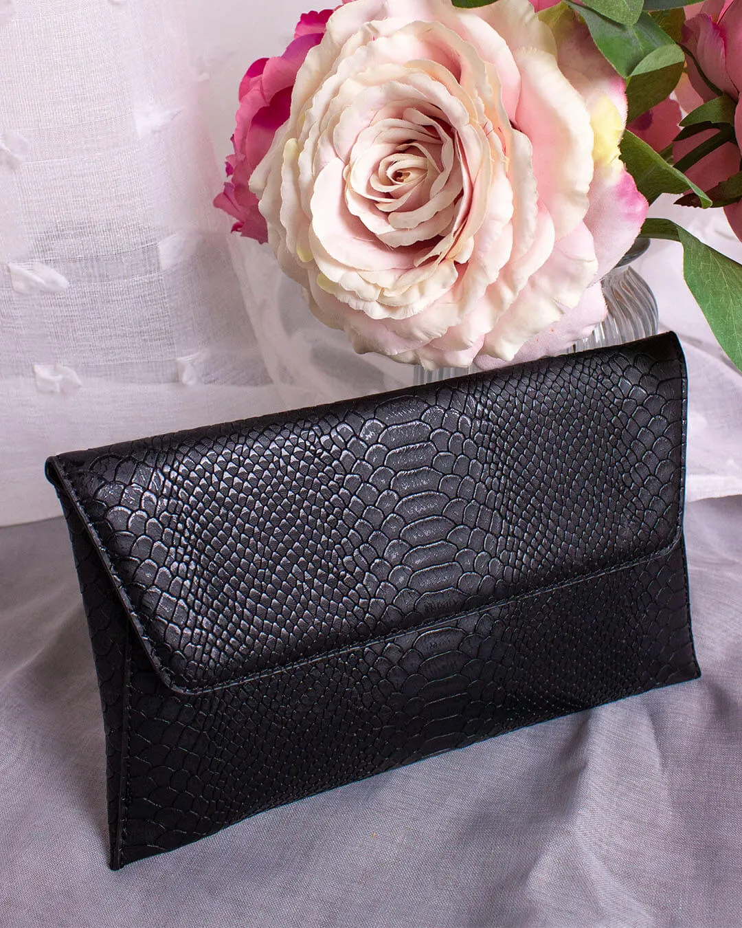 MEDUSA Snake Clutch Bag in Black sold by Fearless