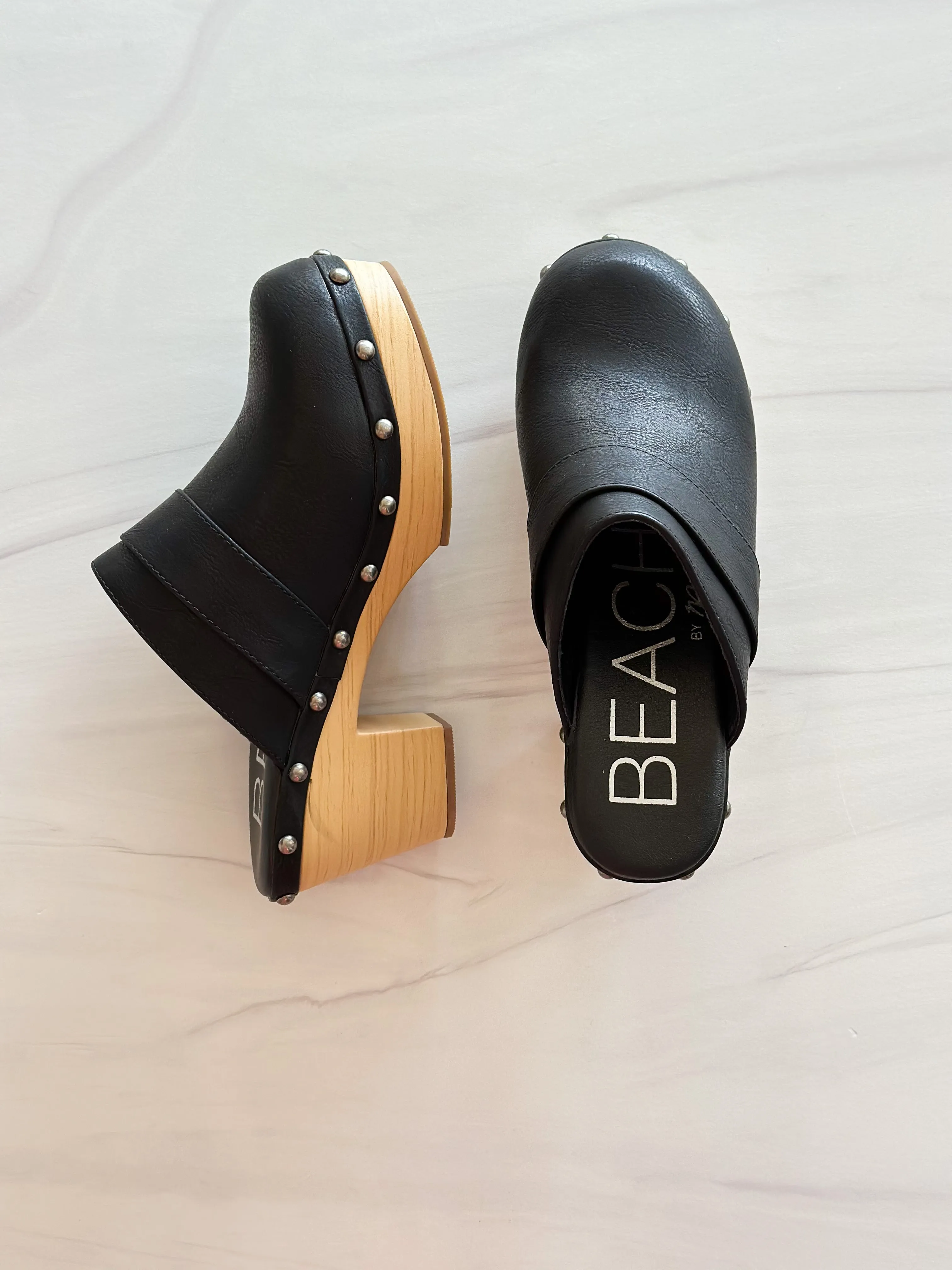 Maverick Clogs | Black sold by Belletique