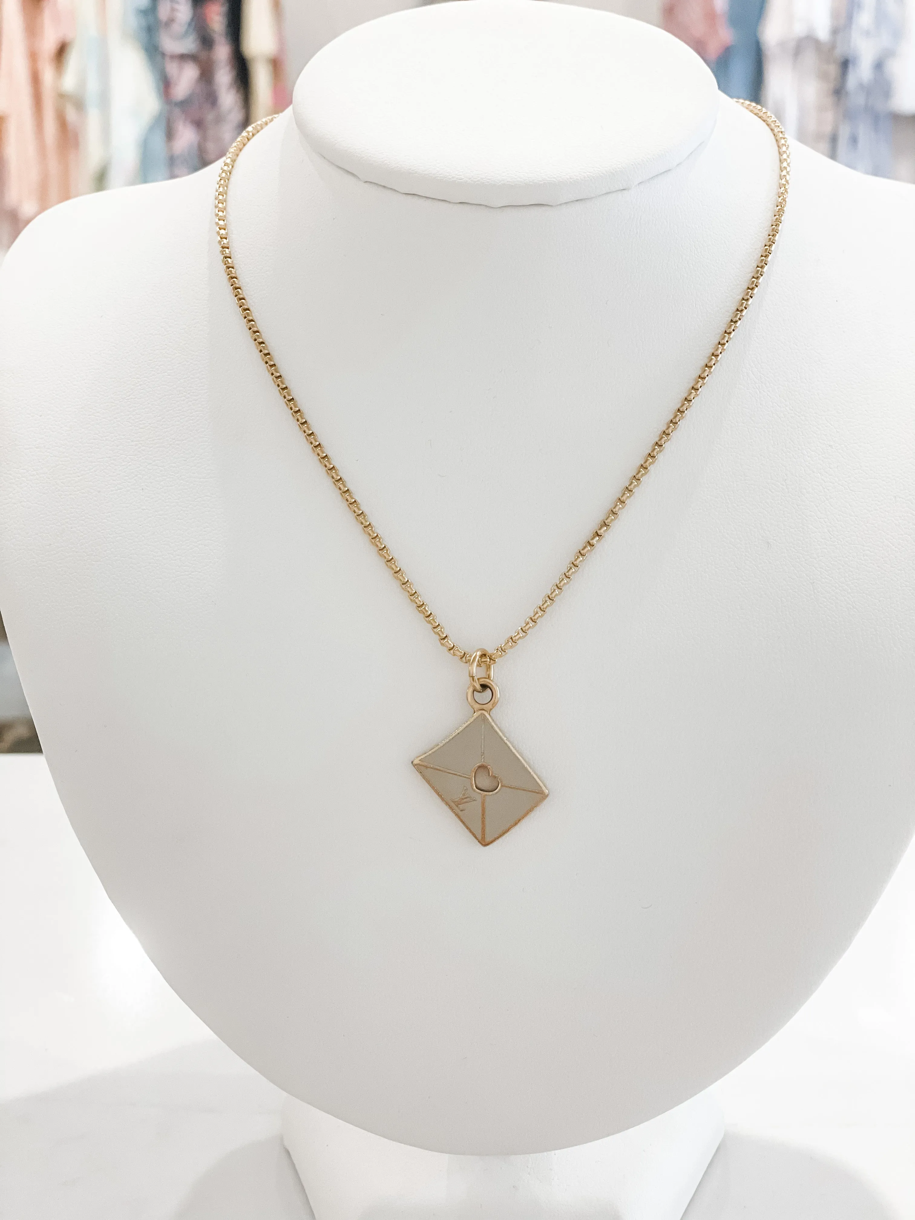 LV Love Letter sold by Belletique