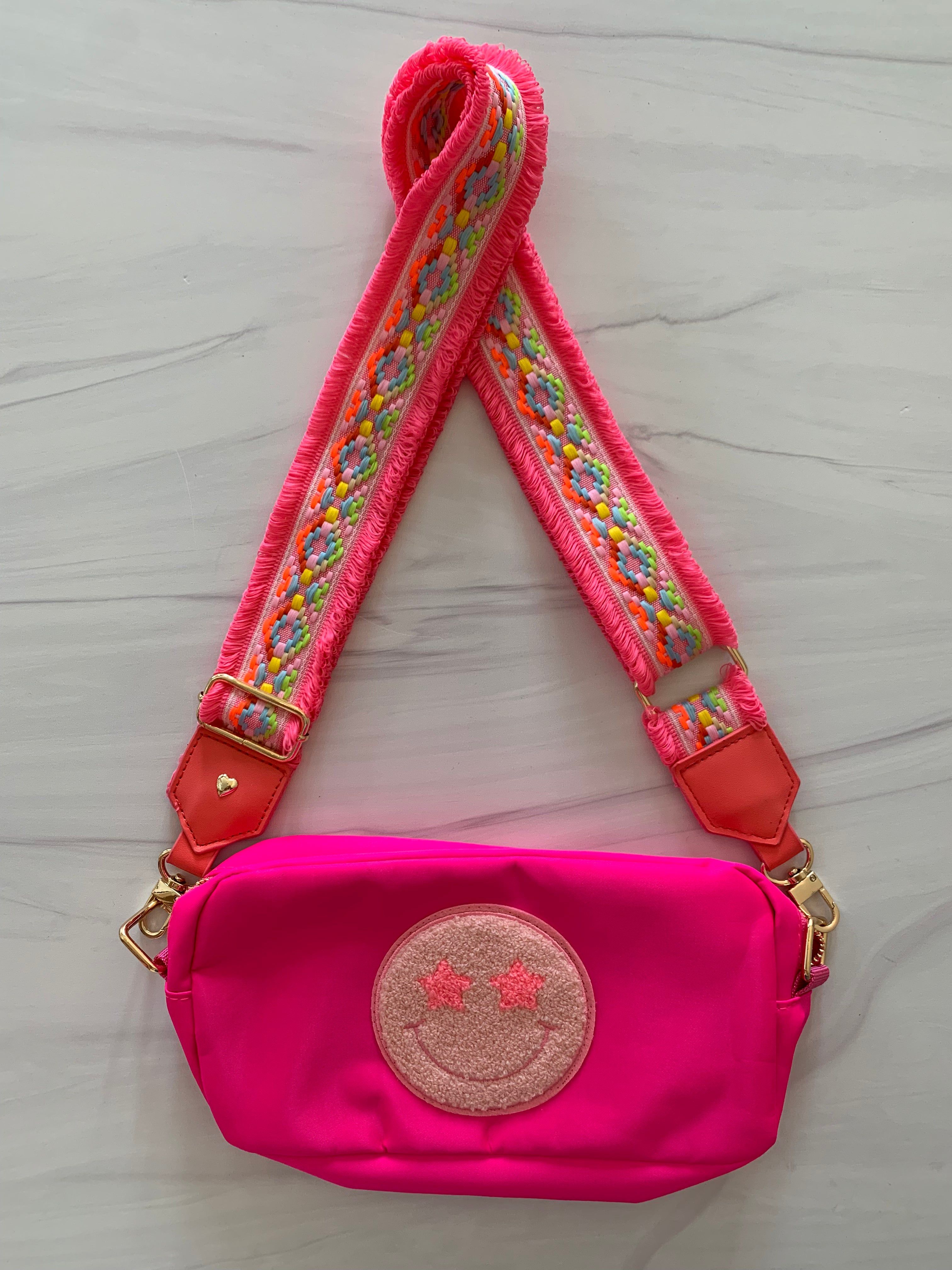 Pink Smiley Bag with Fringe Strap sold by Belletique