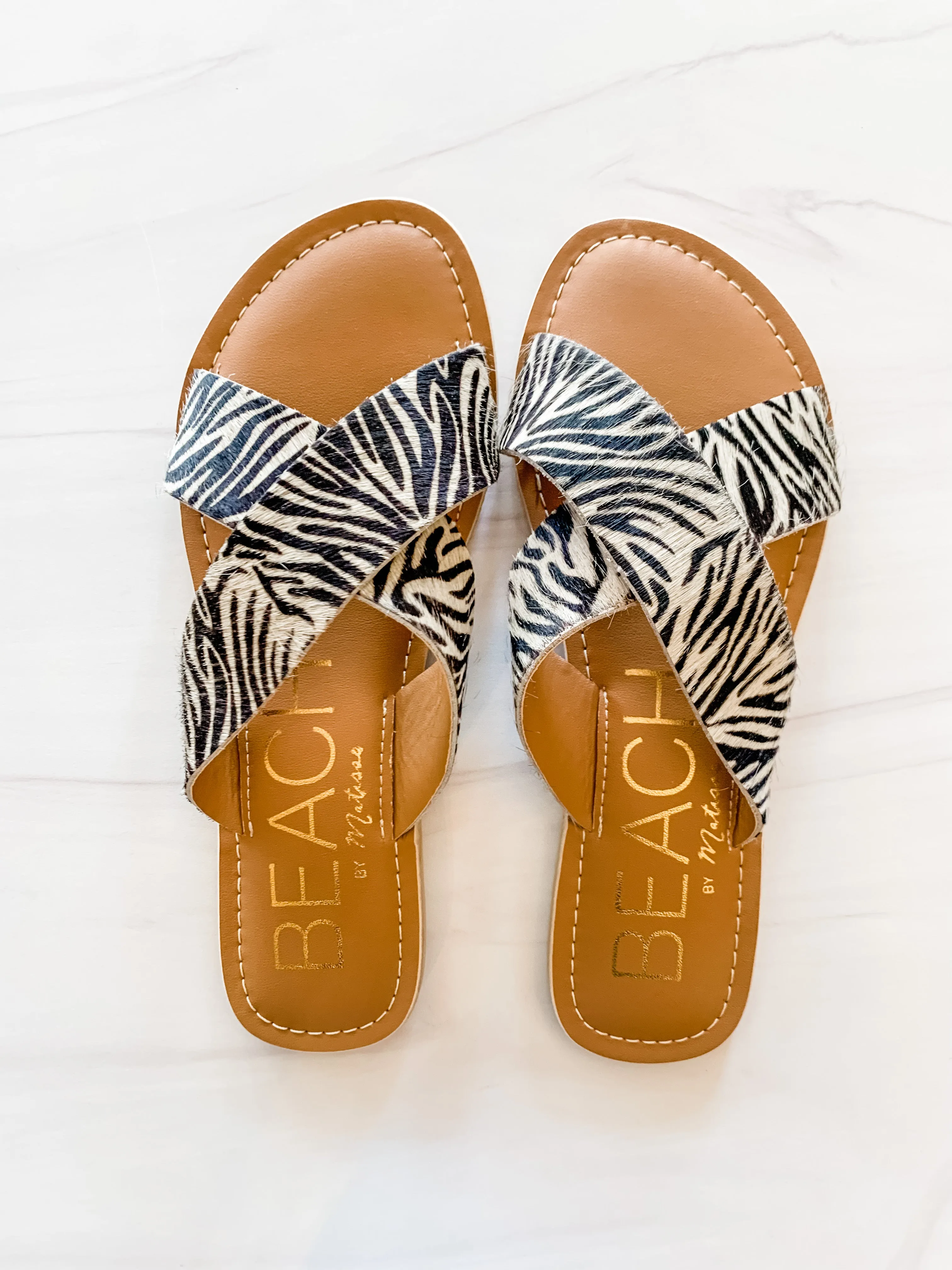 Pebble Slide Sandal sold by Belletique