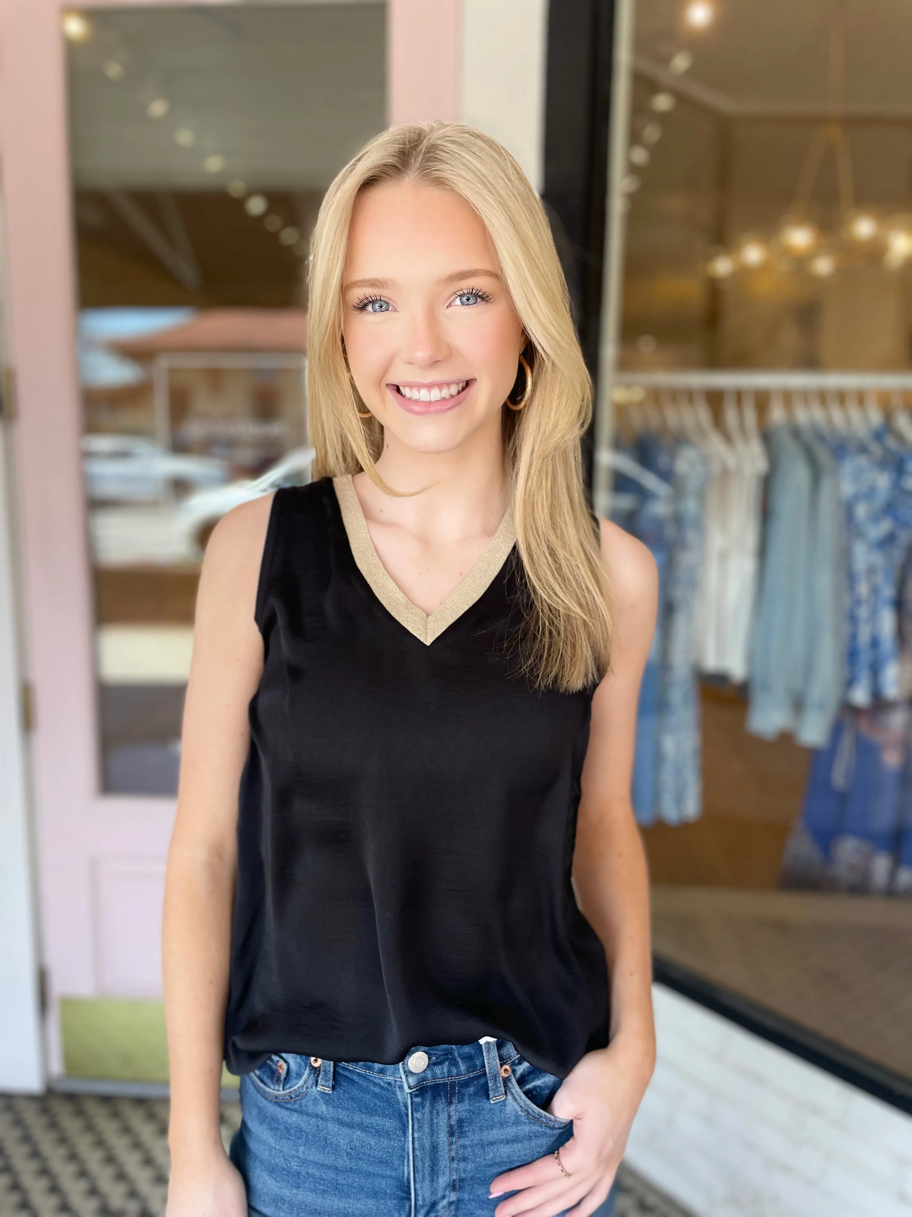 Black + Gold Blouse sold by Belletique