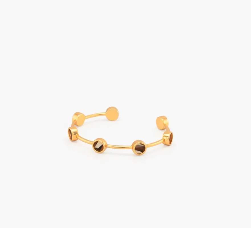 Oncidium Multi-Bezel Cuff sold by Belletique