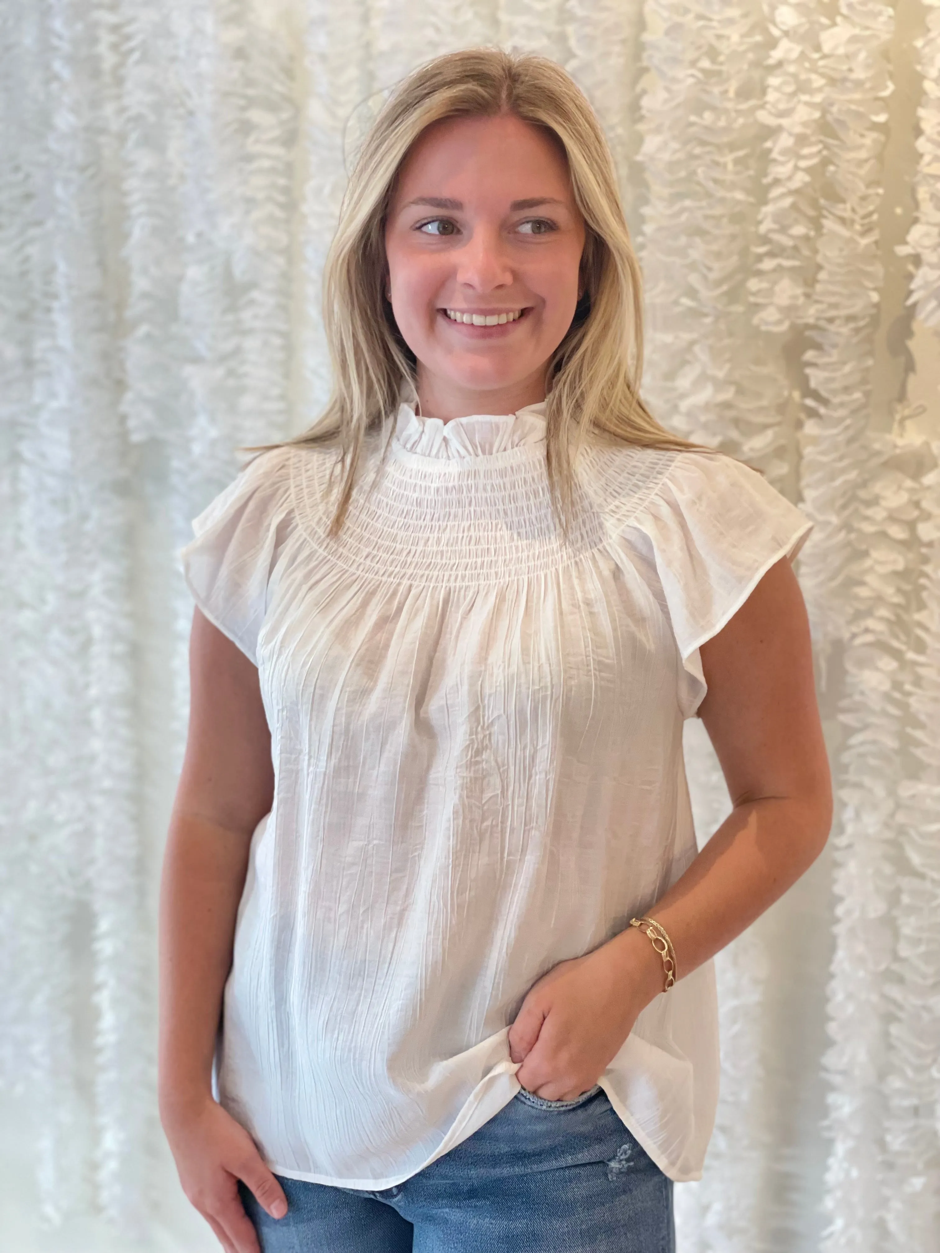 Sleeveless Smocked Blouse sold by Belletique