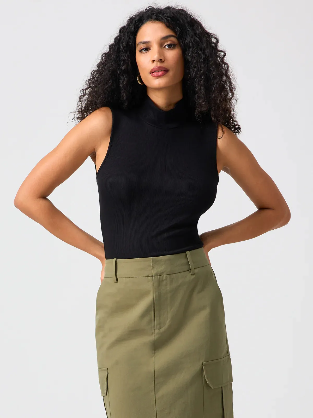 Essential Sleeveless Mock Neck | Black sold by Belletique