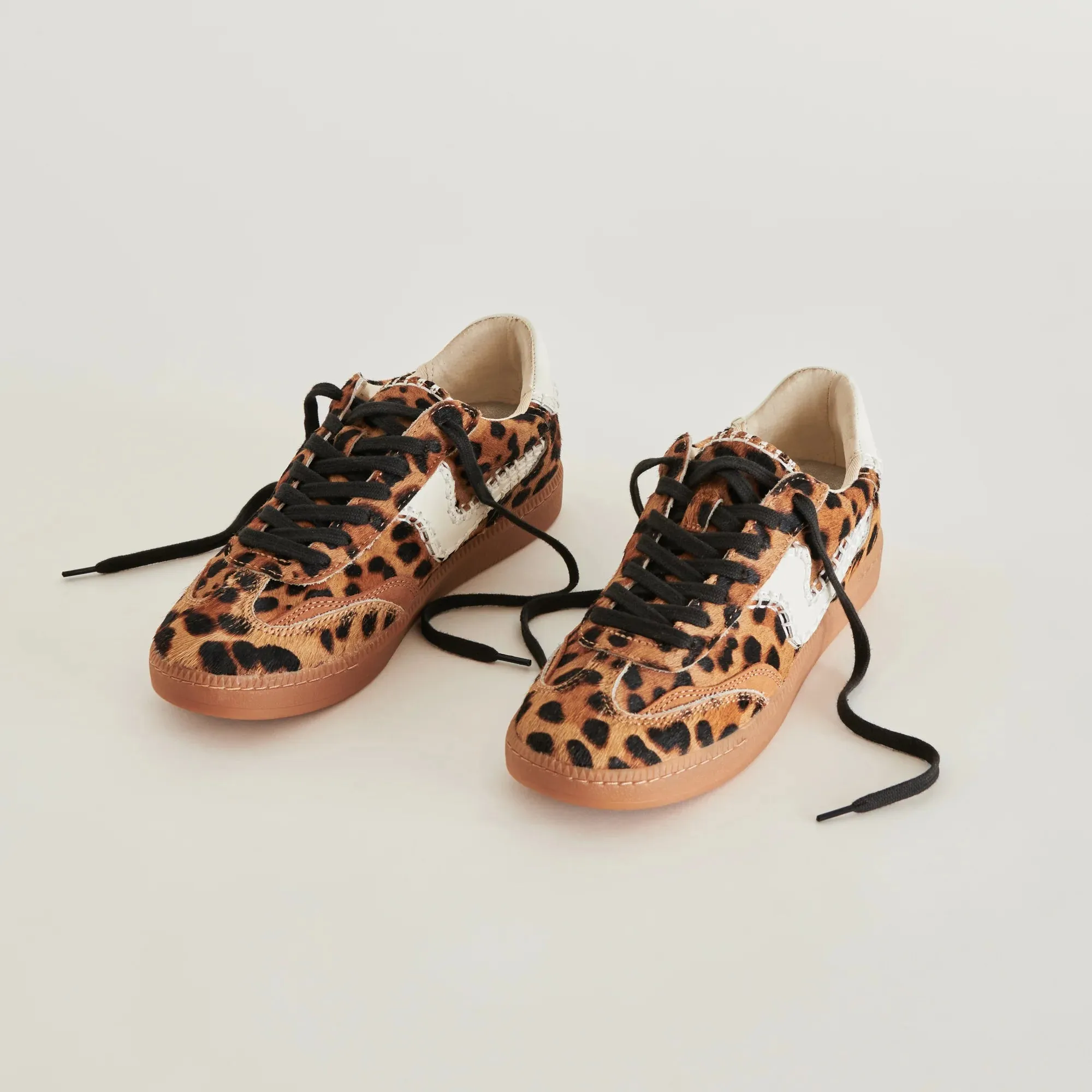 Notice Stitch Sneakers | Dk Leopard sold by Belletique