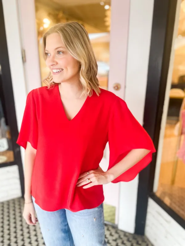 Nina Blouse | Fiery Red sold by Belletique