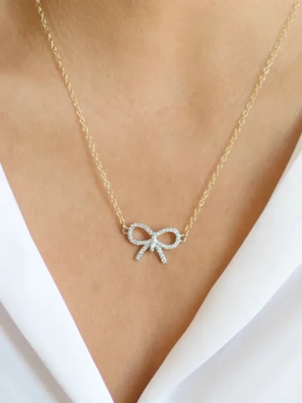 Prim & Proper Bow Necklace sold by Belletique
