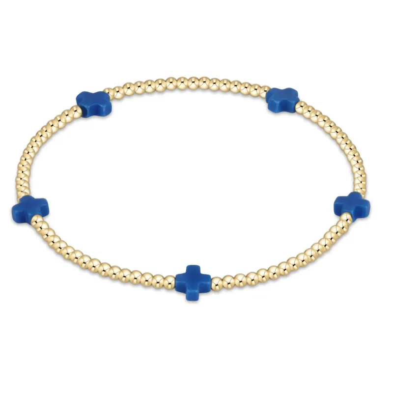 cobalt - 2mm signature small cross gold pattern bead bracelet sold by Belletique