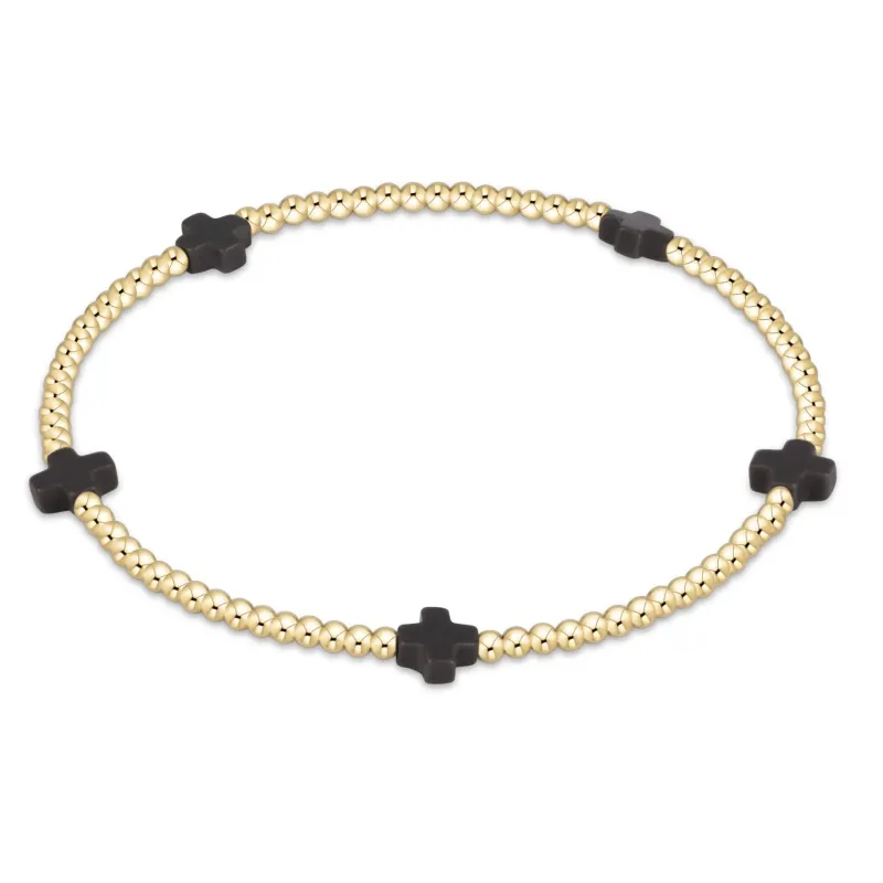 charcoal - 2mm signature small cross gold pattern beaded bracelet sold by Belletique