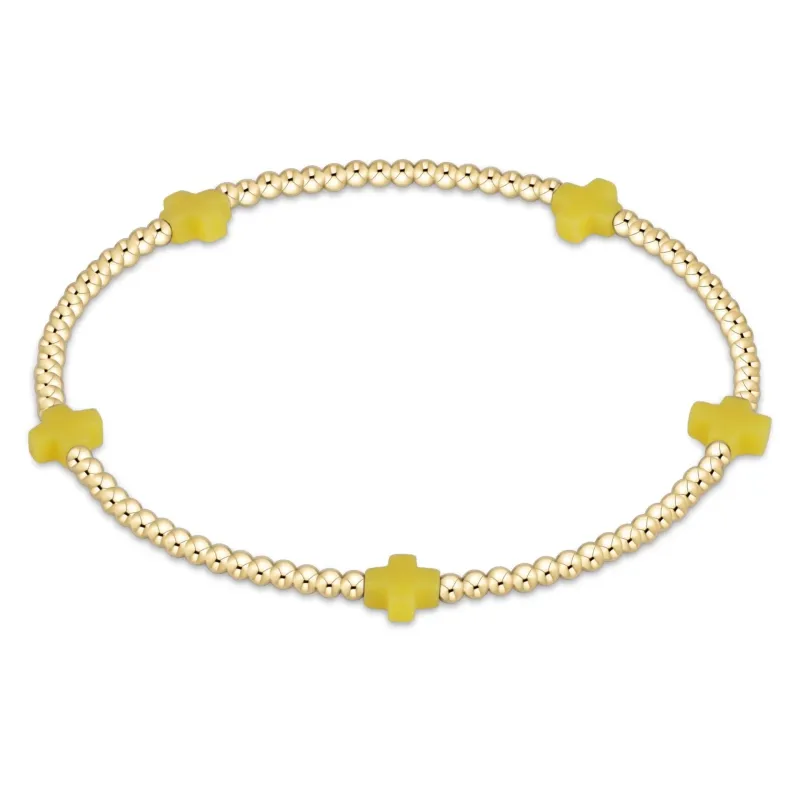 canary - 2mm signature small cross gold pattern beaded bracelet sold by Belletique