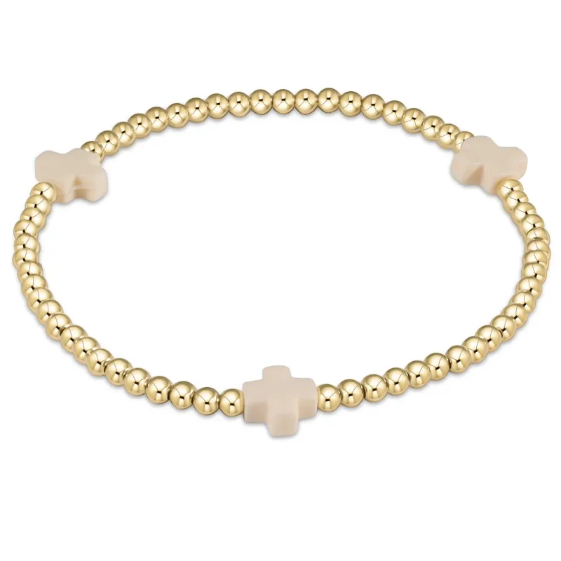 signature cross gold pattern 3mm bead bracelet - off-white sold by Belletique