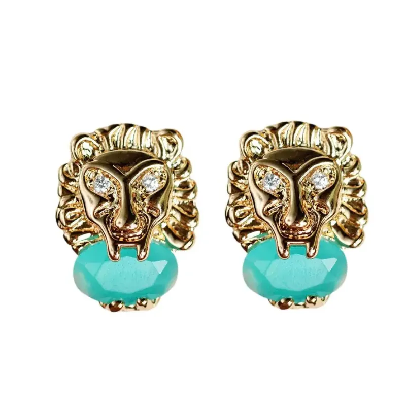 Turquoise + Gold Lion Stud Earrings made by Belletique
