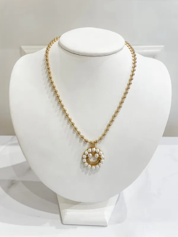 Smiley Necklace sold by Belletique