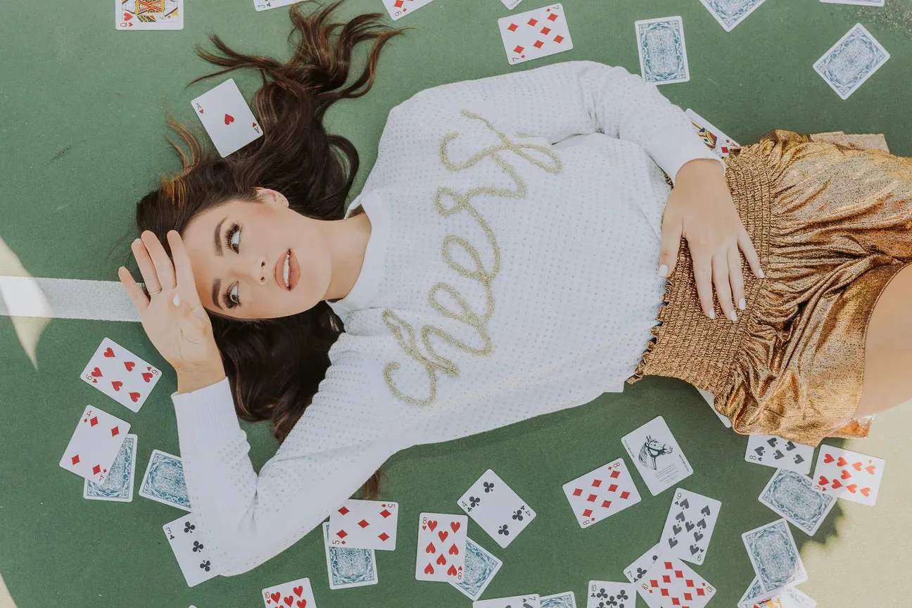 Rhinestone Cheers Sweater sold by Belletique