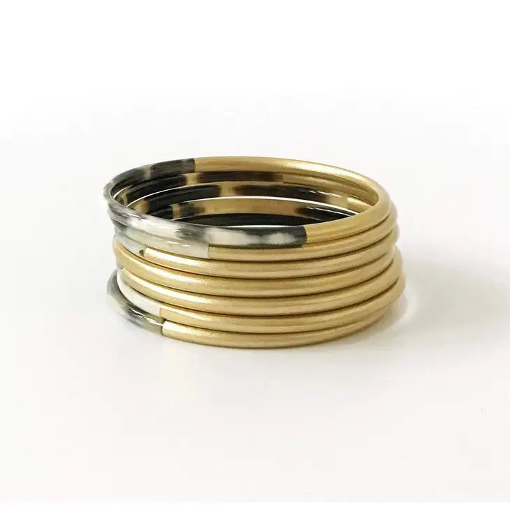 Shiny Gold Horn Bangle Set sold by Belletique