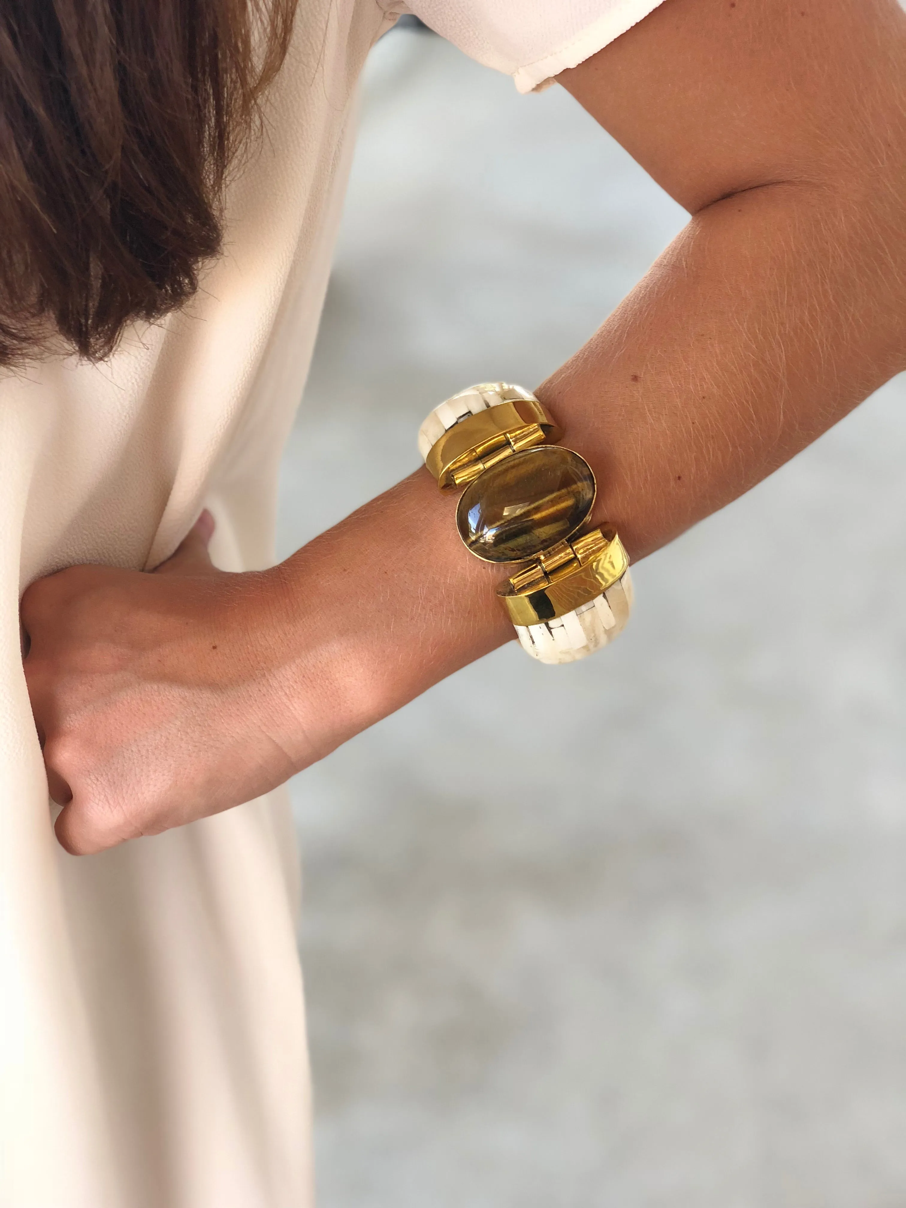 Ivory Water Buffalo Bone Cuff with Tiger Eye Stone sold by Belletique