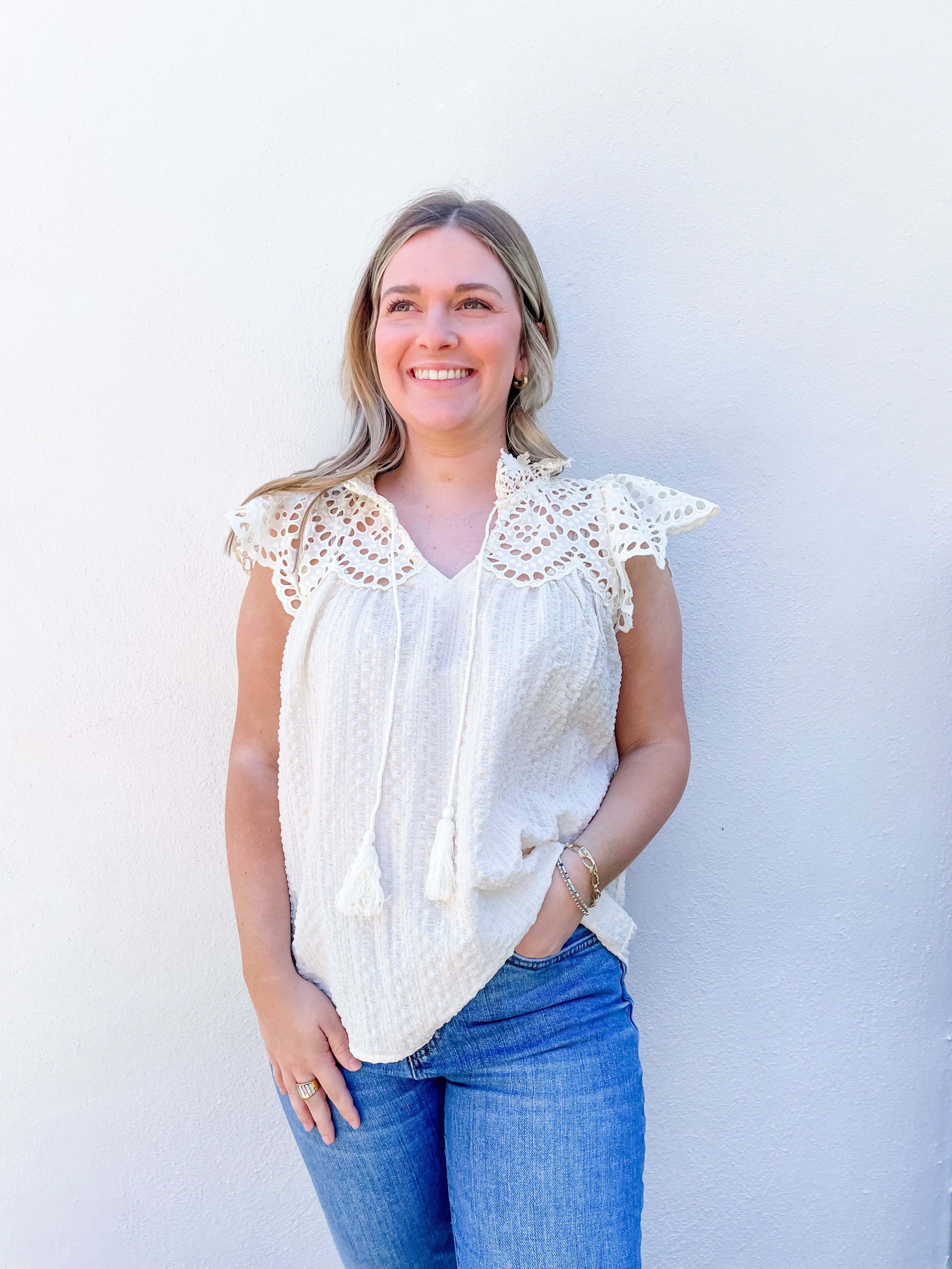 Ruffle with Eyelet Top sold by Belletique