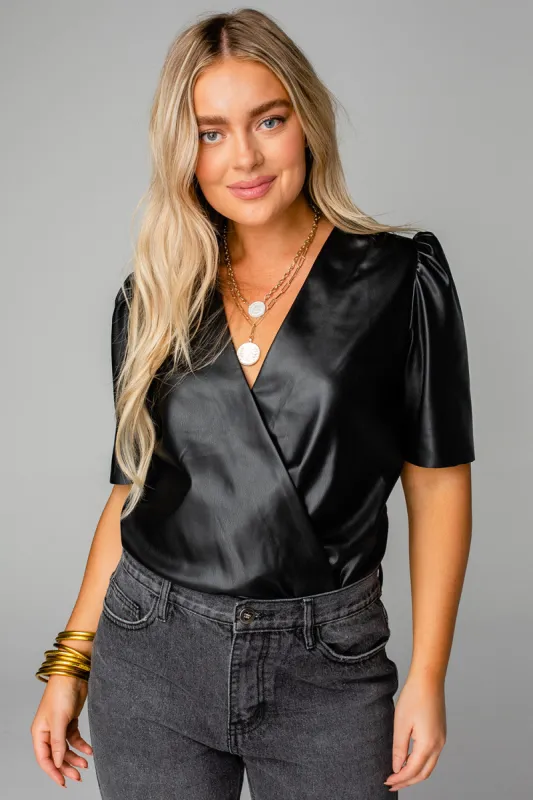 Ava Bodysuit | Black sold by Belletique