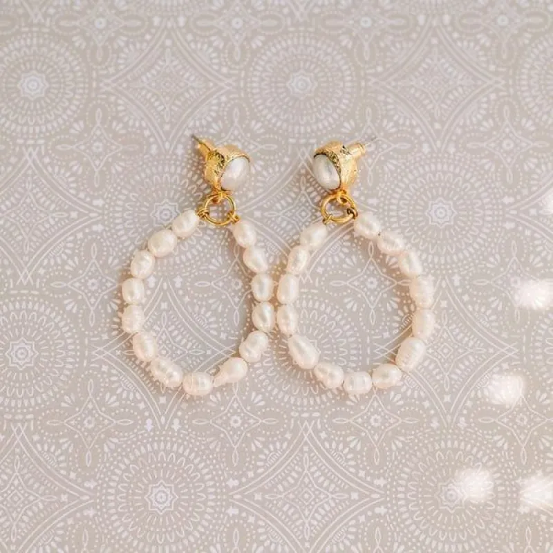 Pearl Teardrop Earrings sold by Belletique