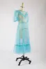 One-of-a-Kind Ruffle May Dress in Turquoise Flocked Polka Dot sold by Batsheva