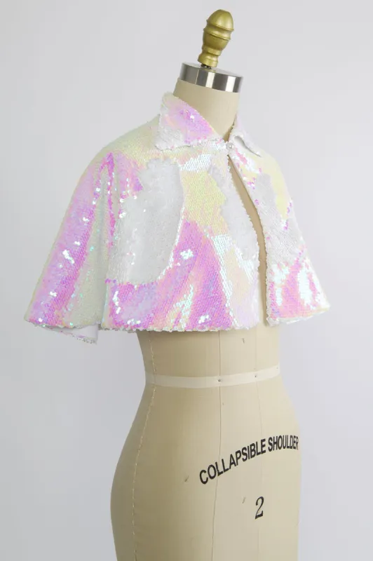 Synergy Cape in White Flip Sequin sold by Batsheva