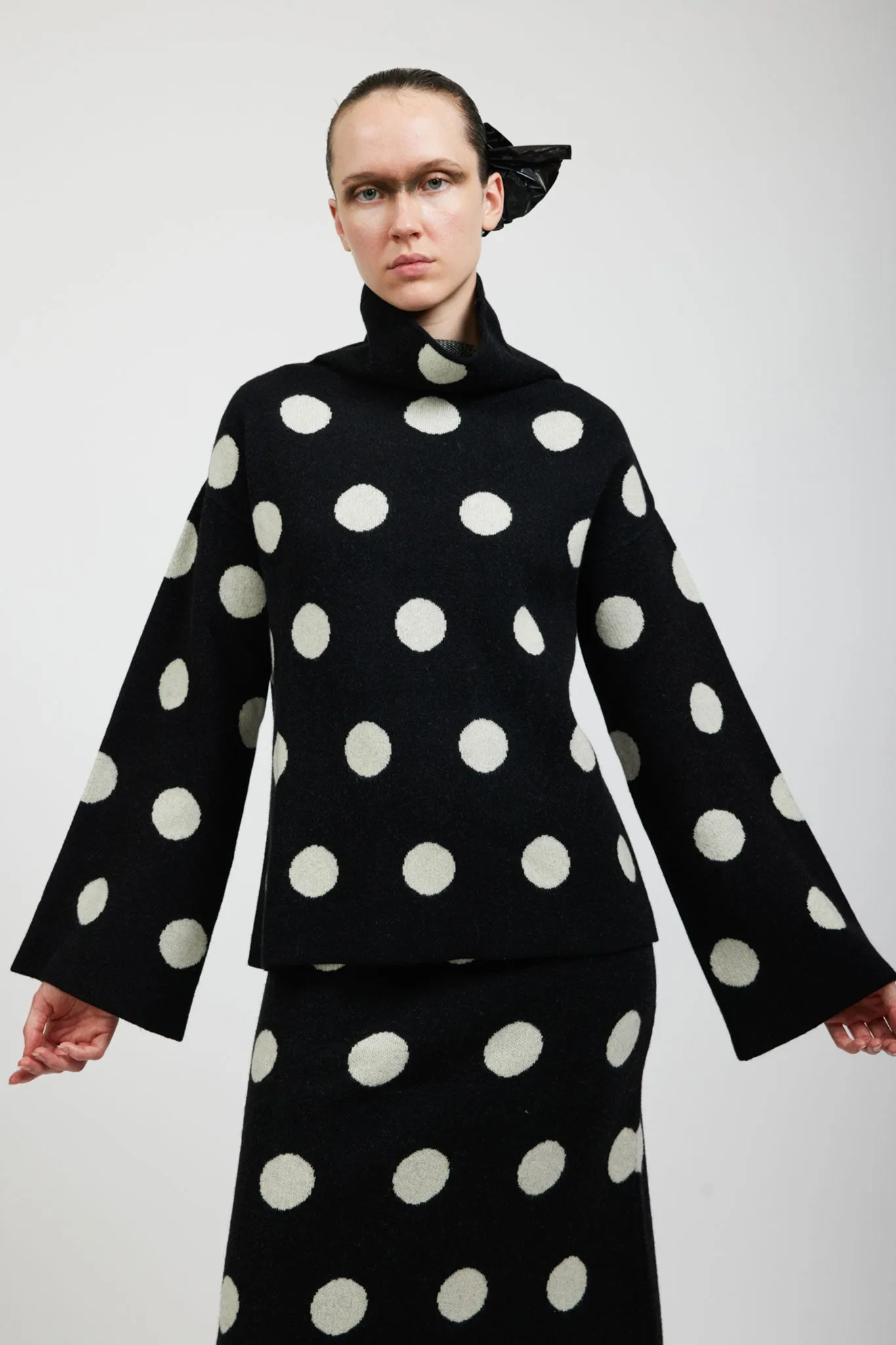 Saga Polka Dot Cashmere Turtleneck in Black sold by Batsheva