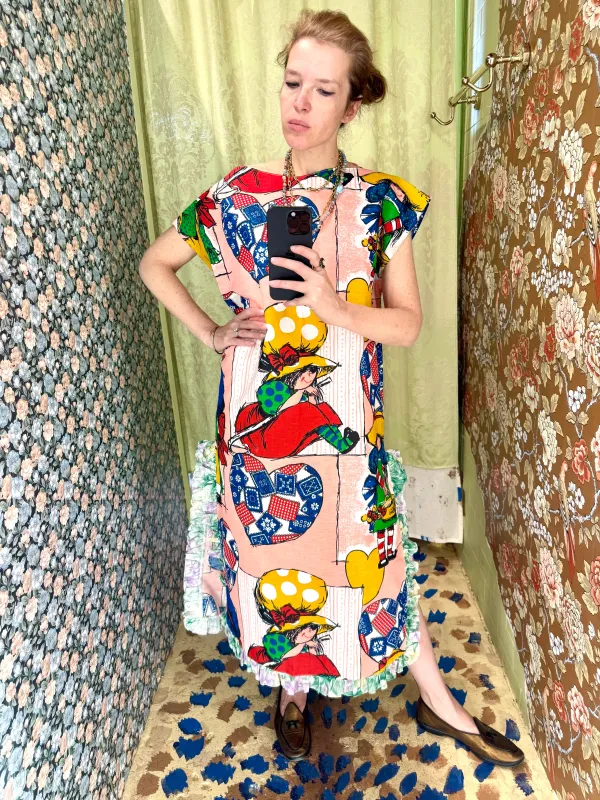 Caftan in Vintage Sunbonnet Girl Print sold by Batsheva