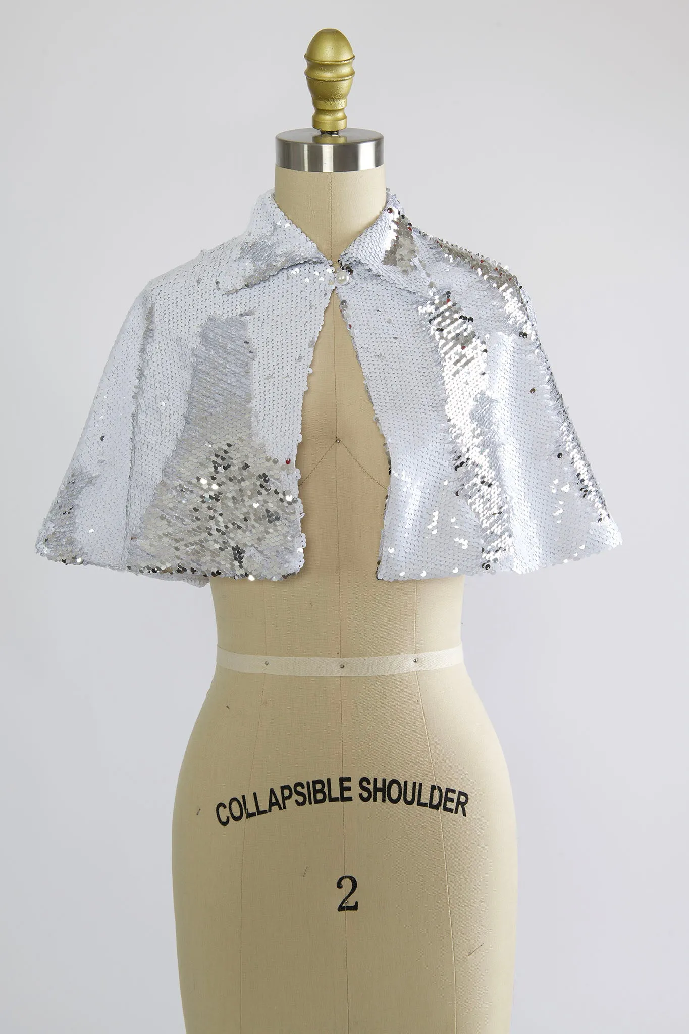 Synergy Cape in Silver & White Sequin sold by Batsheva