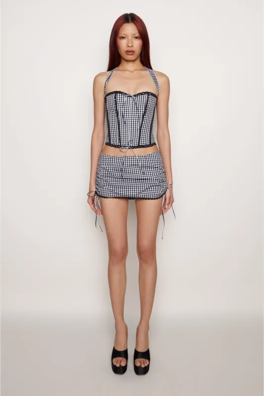 Gingham Ruched Side Tie Mini Skirt sold by Guizio
