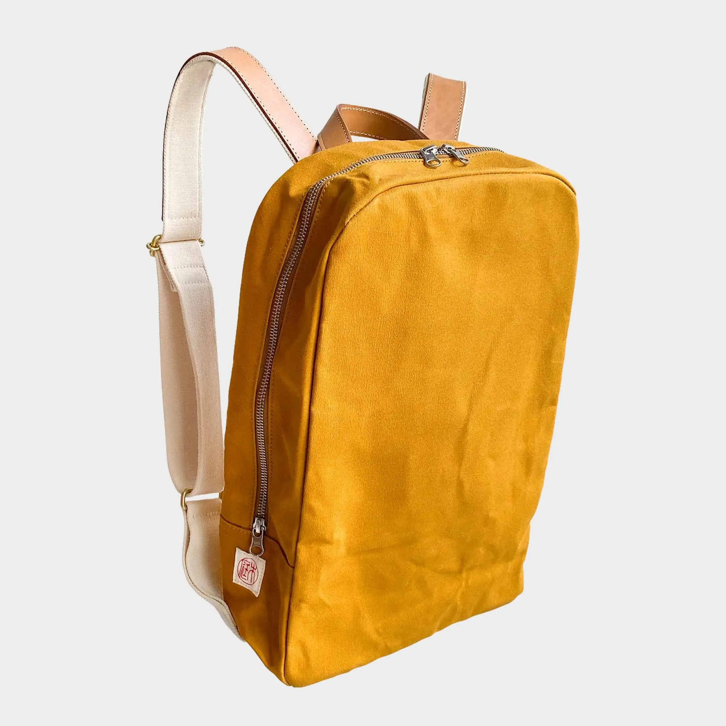 Nizyū Kanō X Niwaki Rucksack in Marigold sold by Gardenheir