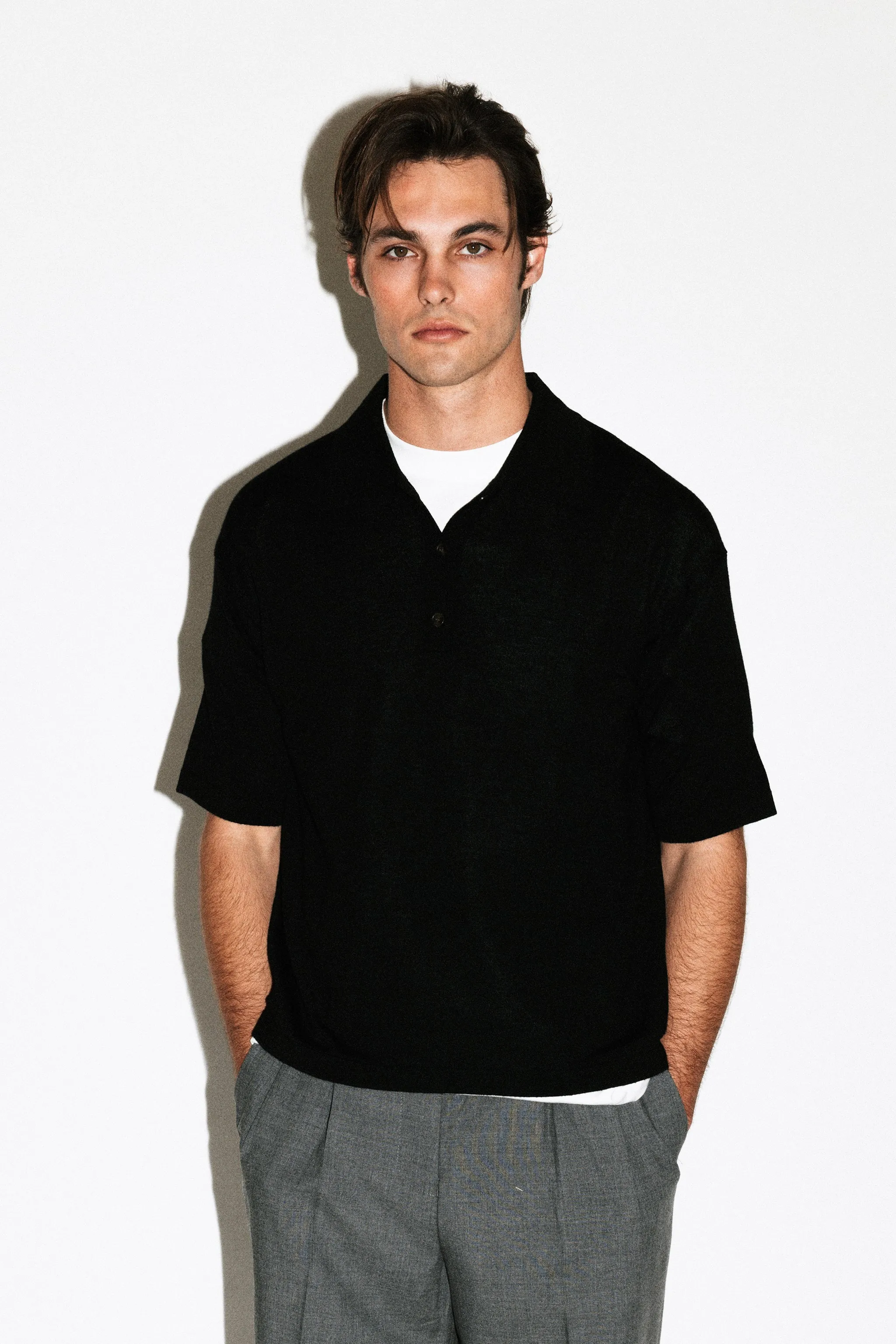 Deane Oversized Merino Polo | Black sold by California Arts