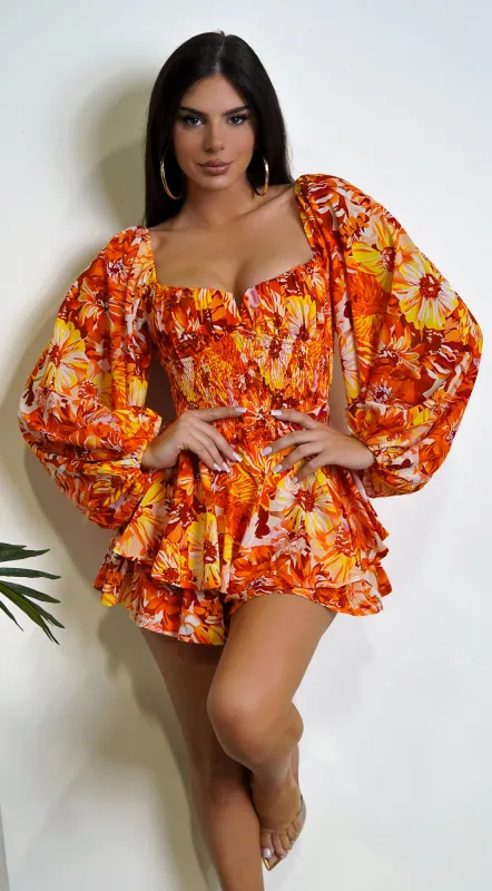 Mel Orange Multi Color Floral Print Romper sold by Emprada