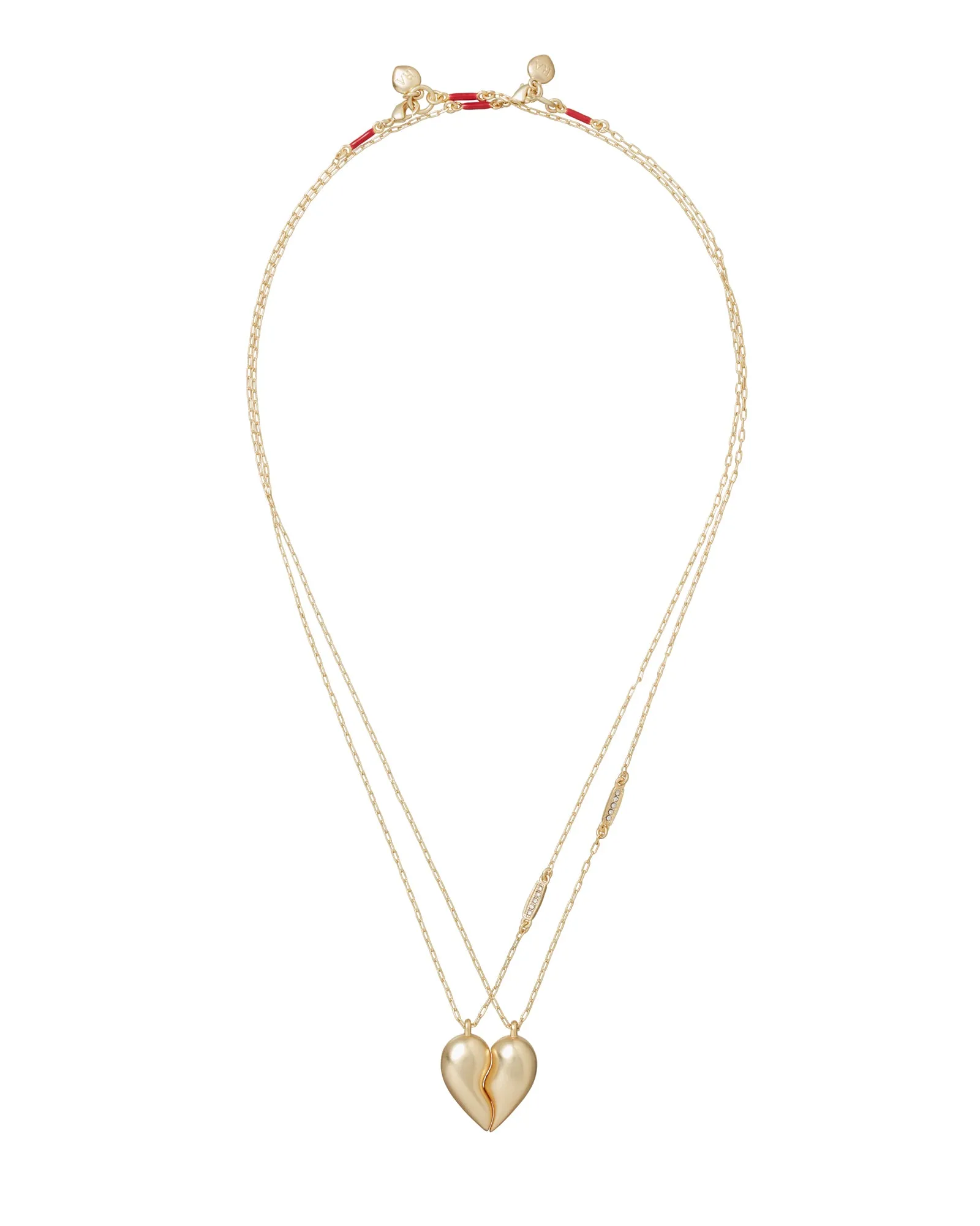 The You and Me Heart Pendant Duo sold by Roxanne Assoulin