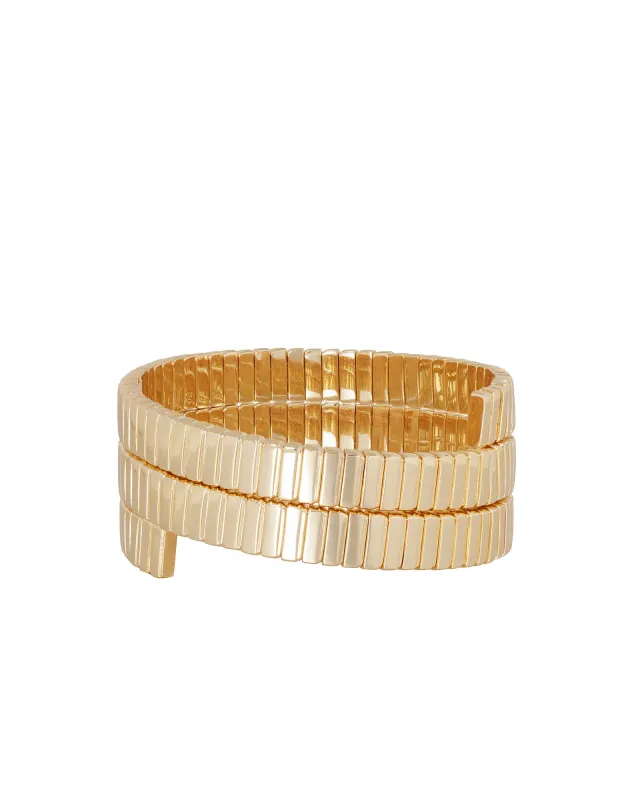 The Cobra Triple Wrap Bracelet in Gold sold by Roxanne Assoulin