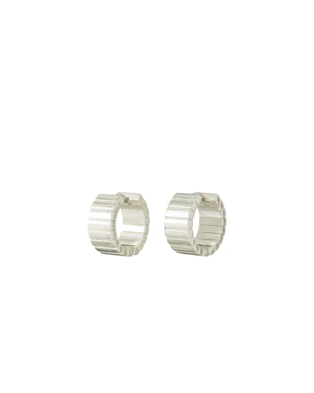 The Flat Cobra Huggie in Silver sold by Roxanne Assoulin